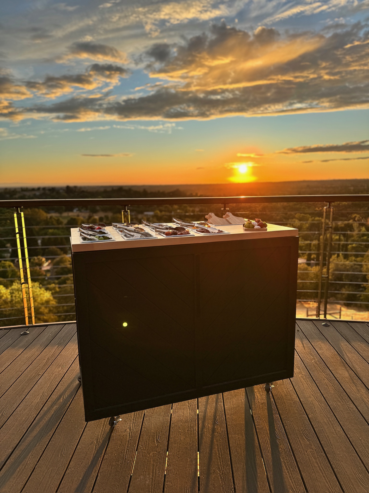 Prime Time Grazing Co. mobile catering bar at sunset